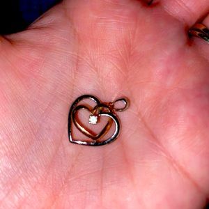 Two-tone silver and rose gold heart pendant